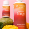 Essenza di Mango flessen en mango's op tafel